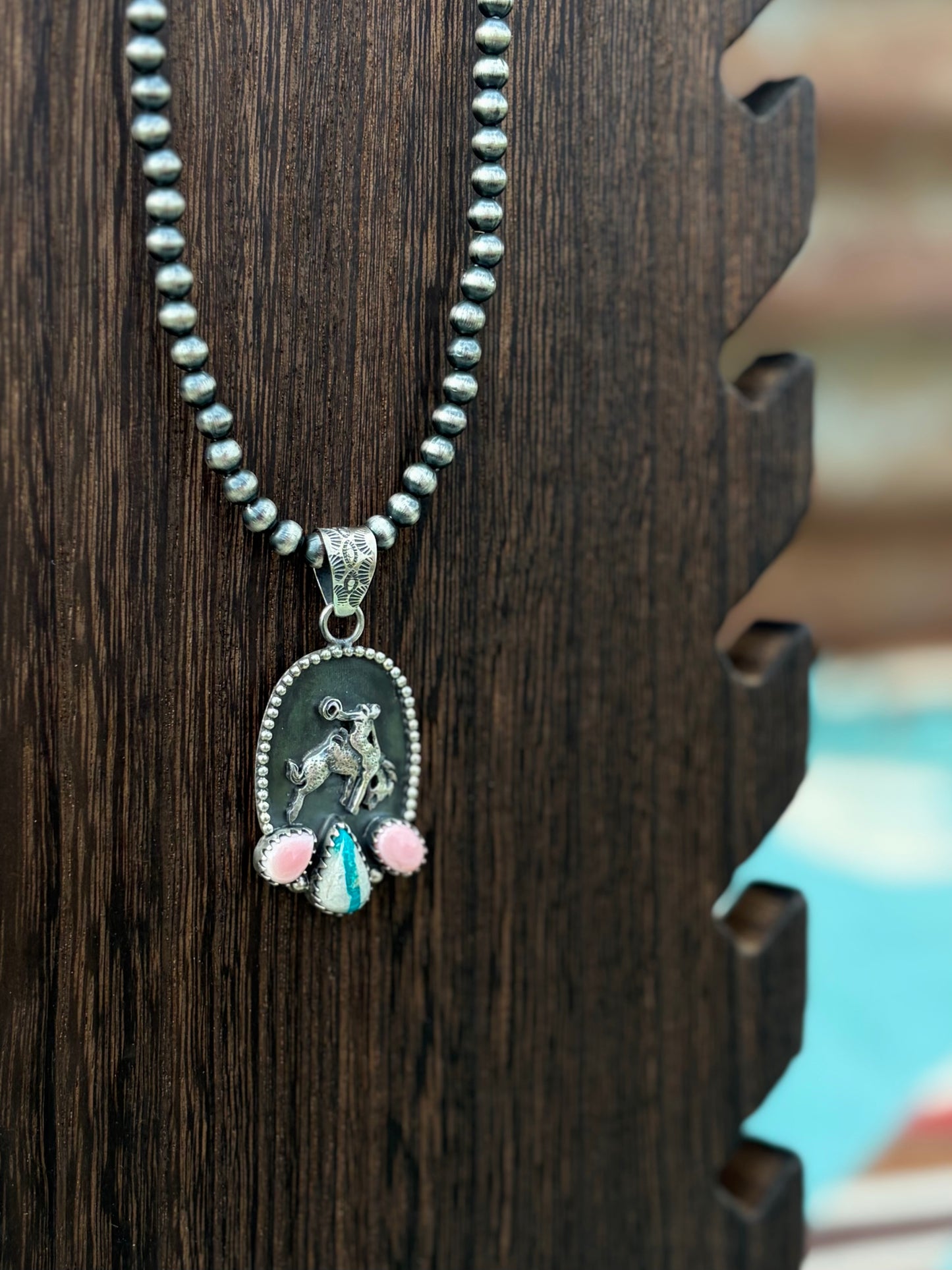 Bronc pendant