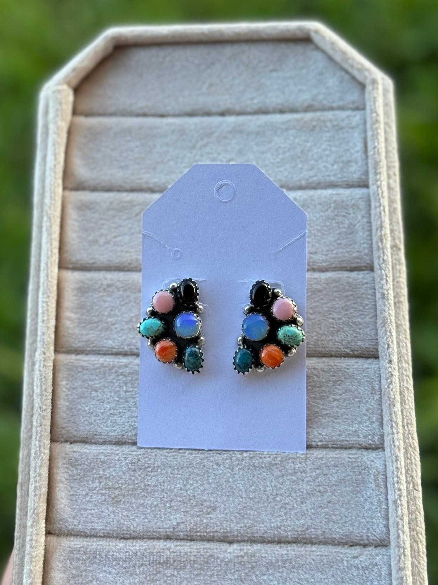 Half cluster earrings
