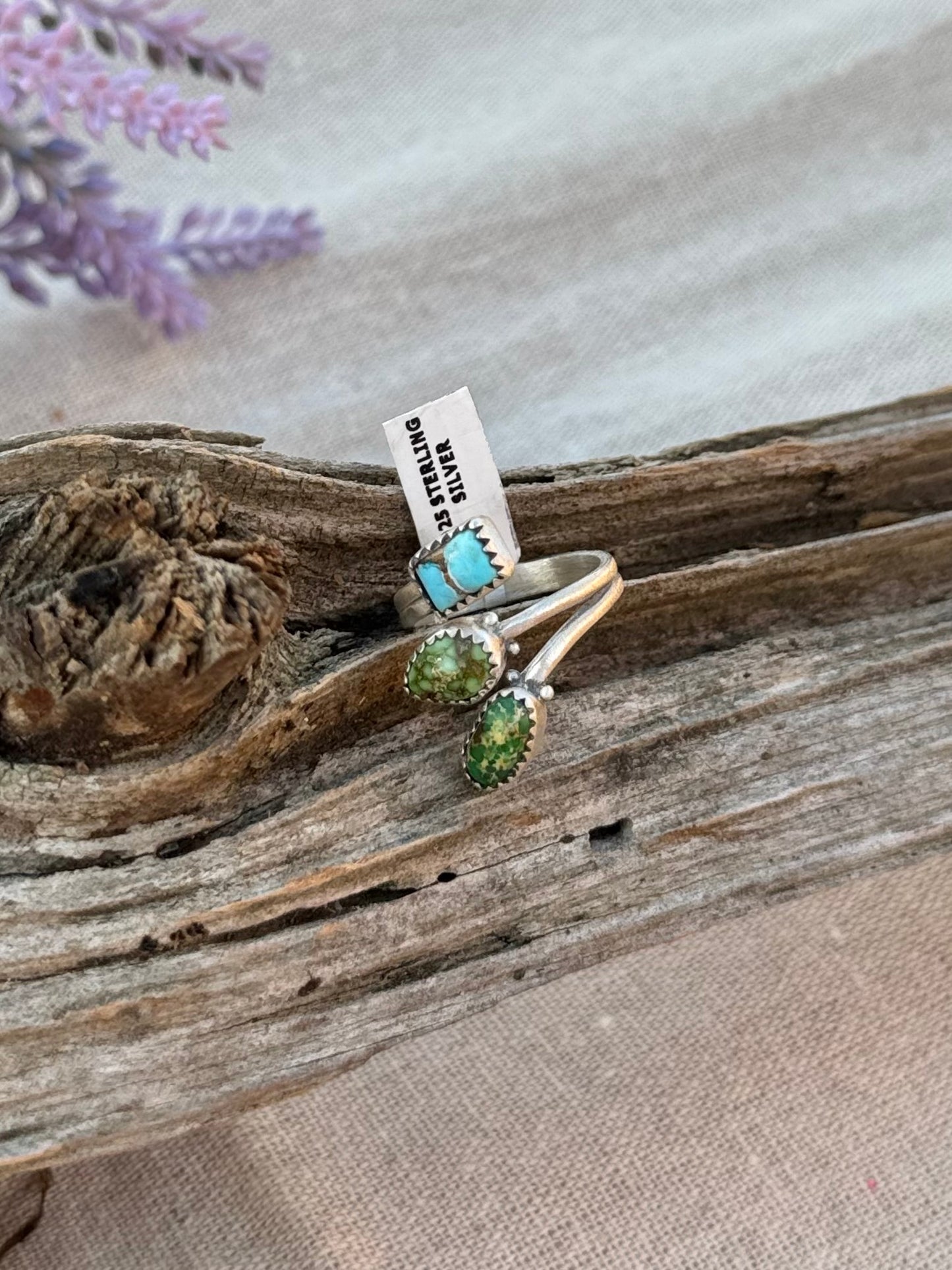 Three Stone Bypass ring